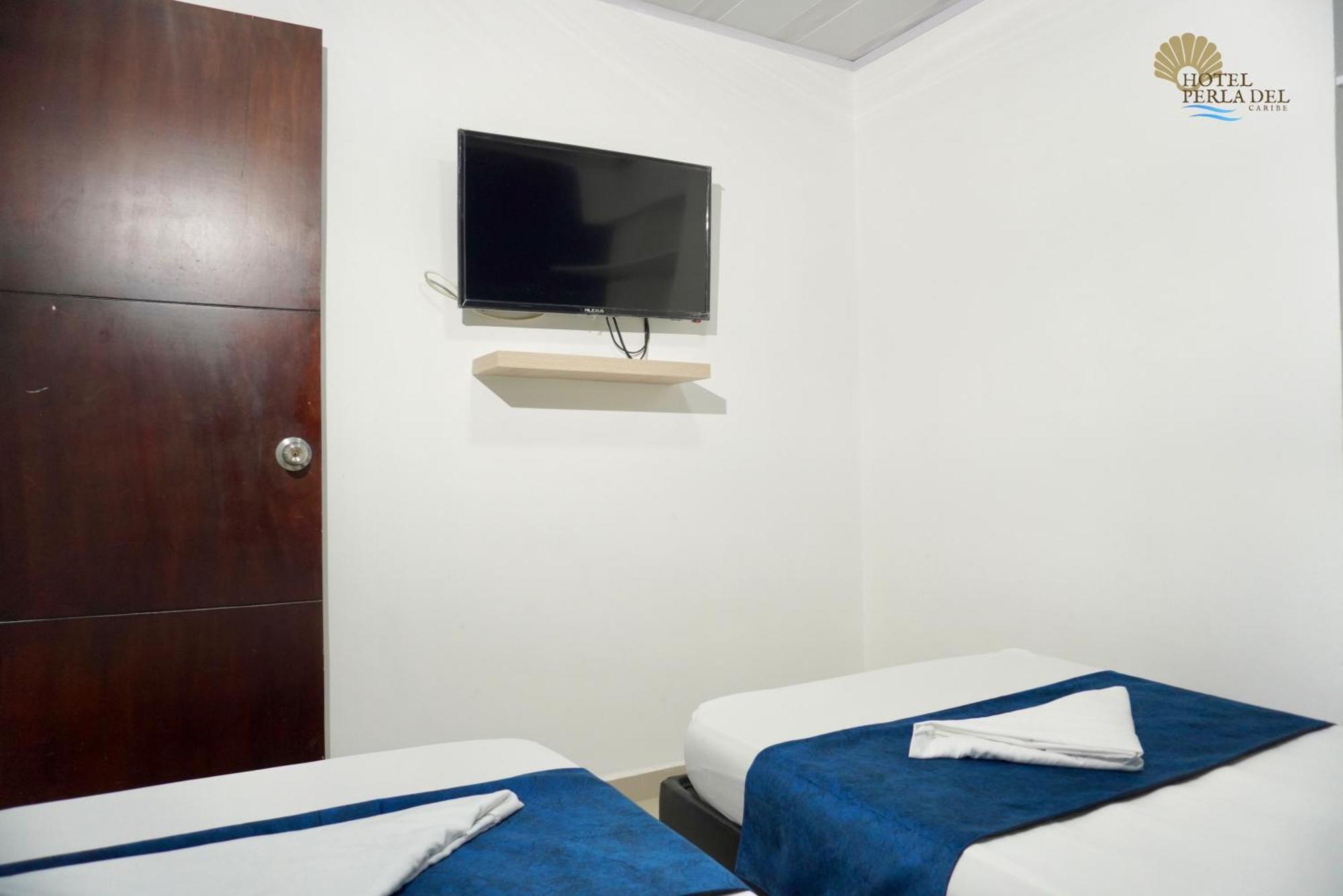 Hotel Perla Del Caribe ซันตามาร์ตา ภายนอก รูปภาพ