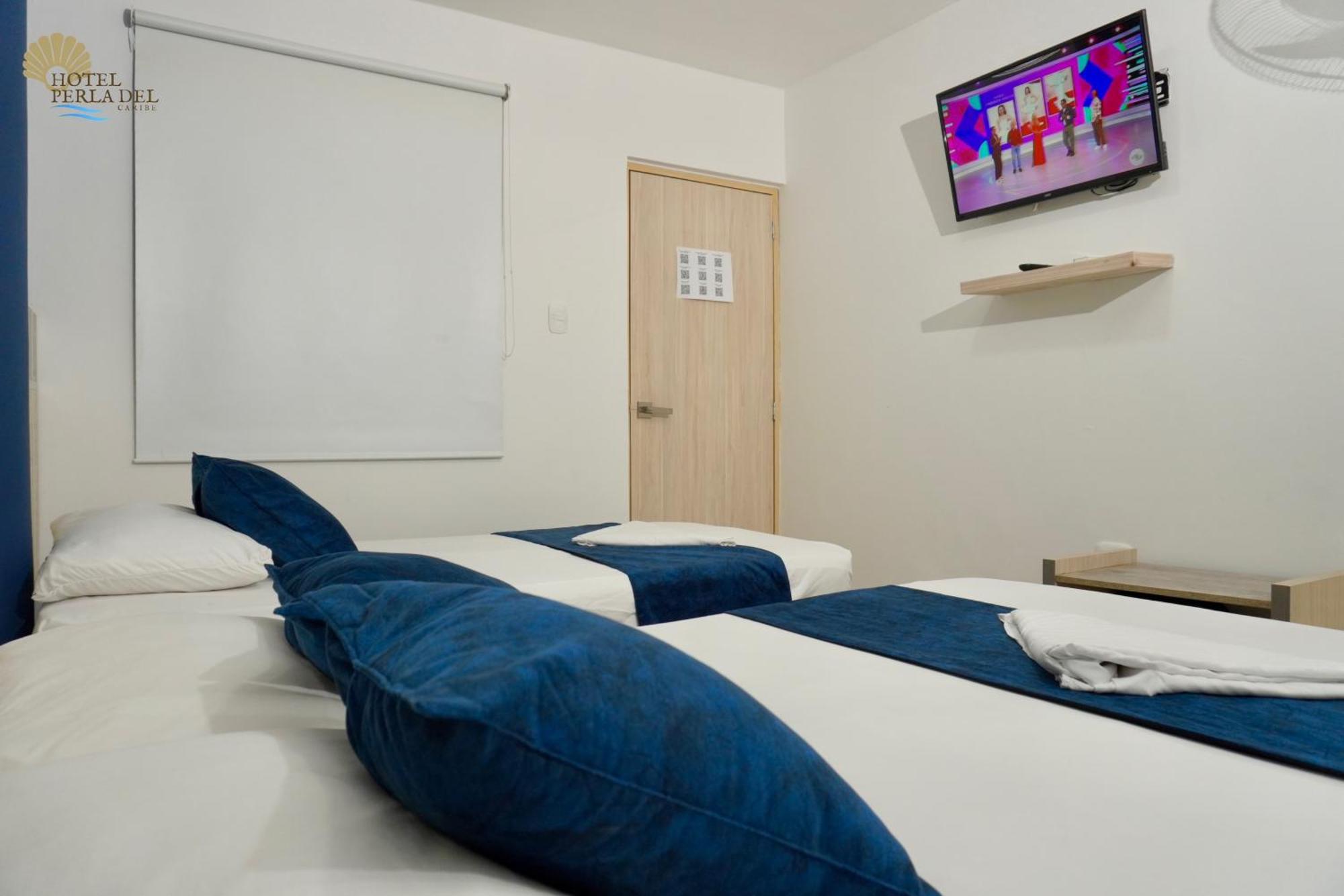 Hotel Perla Del Caribe ซันตามาร์ตา ภายนอก รูปภาพ